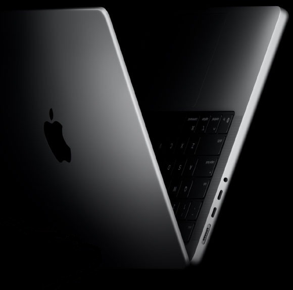 MacBook Pro in space black, lid angled open